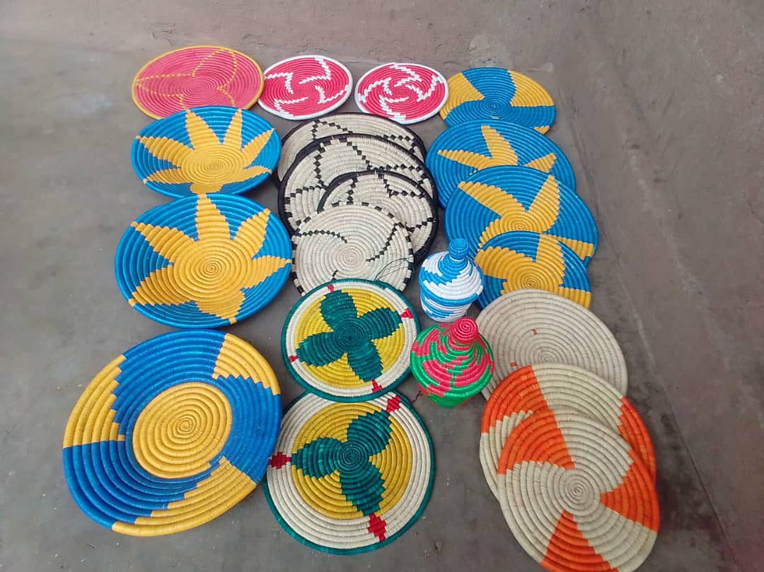Assorted colorful handwoven mats.