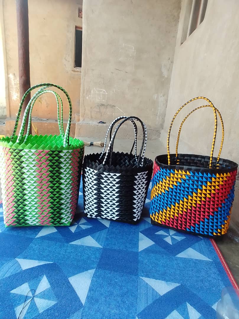 Colorful woven baskets displayed together.