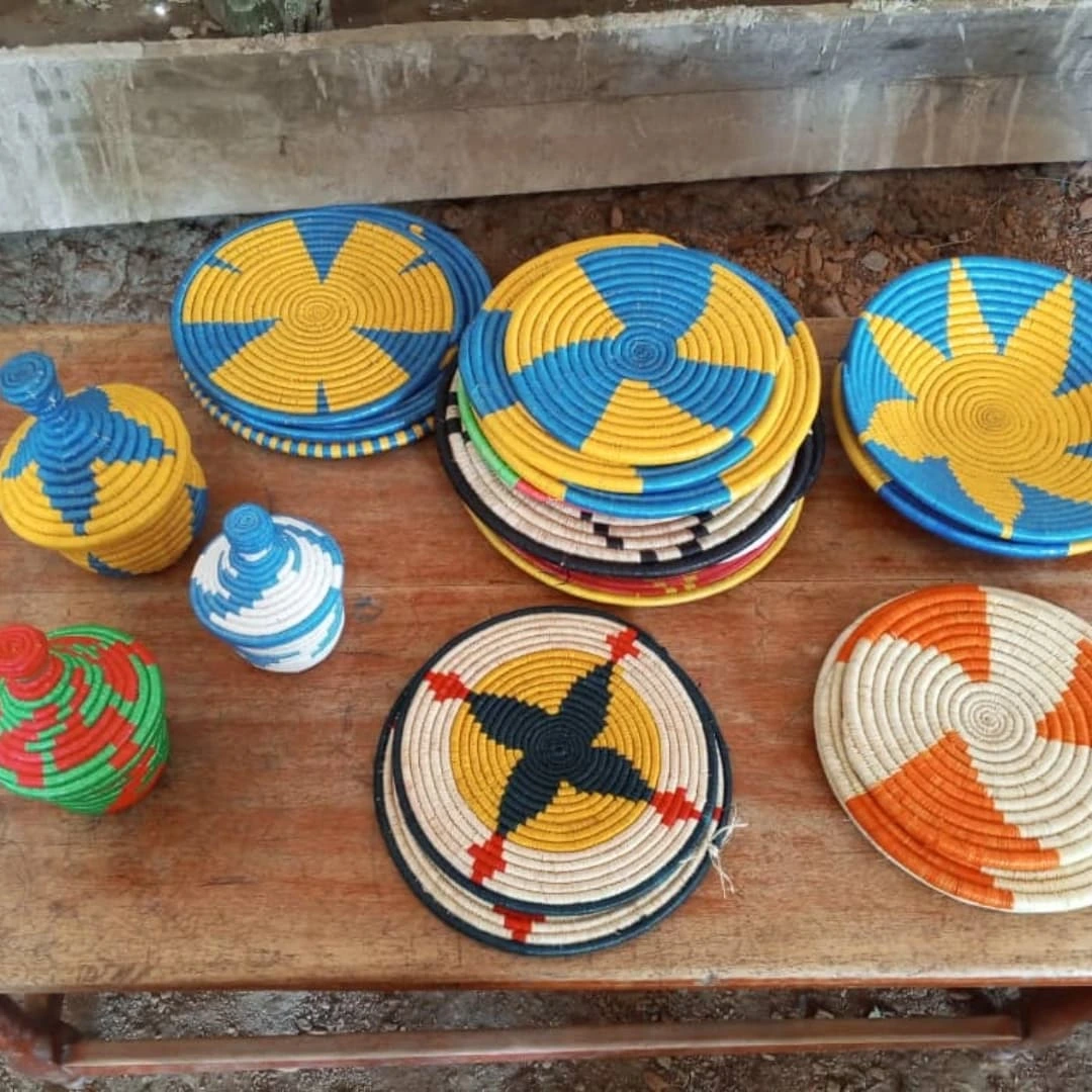 Decorative handwoven baskets displayed on a table.