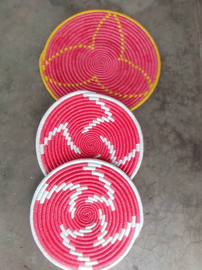Pink and red handwoven basket trays.